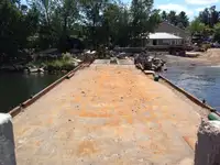 1990 60’ x 16’ x 6’ Steel Deck Barge with Ramps, Spud wells and Spuds